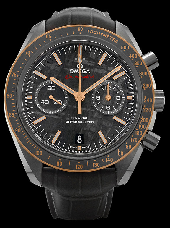 44.25mm - This watch has a grey ceramic case with an 18kt Sedna gold bezel. The bezel has a ceramic ring and brushed "Ceragold" tachymeter scale. There is a sapphire crystal over the meteorite dial. The meteorite dial is made from a solid piece of ancient, extra-terrestrial stone that has been acid etched to reveal a unique pattern. The Moonwatch-style hands are in 18kt Sedna gold. The date can be viewed at 6 o'clock position and small seconds sub dial at the 9 o'clock position.