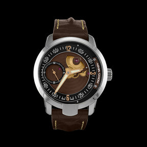 This watch has a stainless steel case with a sapphire crystal over the dial.  The crystal is treated with anti-reflective coating on both sides.  The dial ring is black with rose gold founded appliqué indexes.  The base plate is brown with a small seconds subdial at the 9 o’clock position.  The hands are rose gold with luminescence.  This watch is powered by the AMWII manual wind movement with 5 day power reserve.