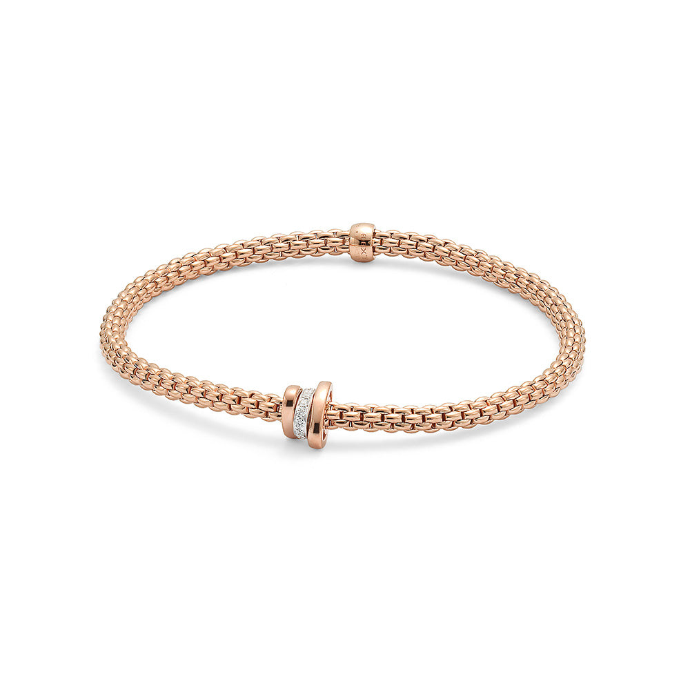 Flexible bracelet entirely made of 18 carat rose gold with rose gold and .10ct diamond rondels ( Size M )