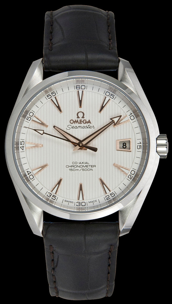 41.5mm- This watch has a stainless steel case and a scratch resistant sapphire crystal over the dial. The dial is a silver color with vertical stripes inspired by a ‘Teak Concept’, a nod to wooden sailboats.  The dial functions include a framed date window at the 3 o’clock position as well as hours, minutes, and central seconds. The hands and indexes are rose gold toned with luminescence. Powering this timepiece is the Omega Co-Axial calibre 8500 automatic movement. 
